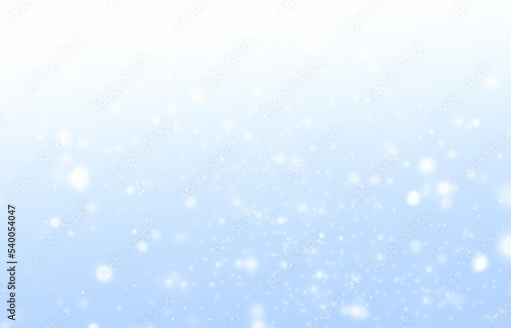 blurry snowflakes on a blue background. Abstract winter background