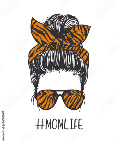 Beautiful woman with messy bun hairstyle, wearing tiger-patterned glasses and ribbon