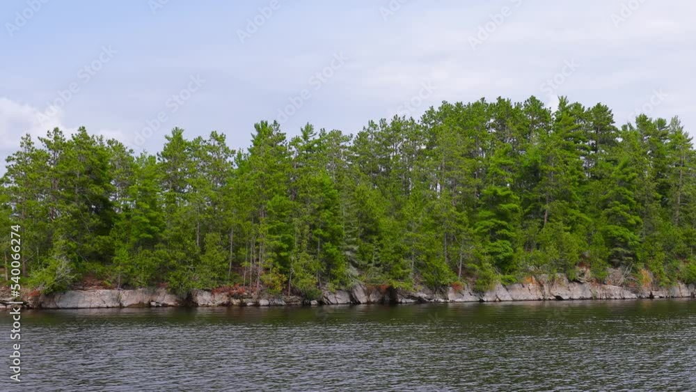 The beautiful Rainy Lake and forests of Voyageurs National Park in northern Minnesota along the border of Canada. The beautiful Rainy Lake and forests of Voyageurs National Park in northern Minnesota along the border of Canada.