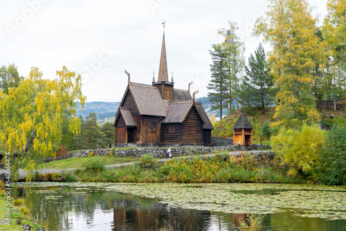 Lillehammer, Norway - September 28, 2022: The Garmo Stave Church at Maihaugen Open-Air Museum in Lillehammer, Norway. Maihaugen is one of the most visited tourist attractions in Lillehammer, Norway.  photo