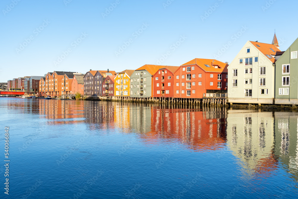 Waterfront colorful houses in Bakklandet, a neighborhood in the city of Trondheim, Norway. 