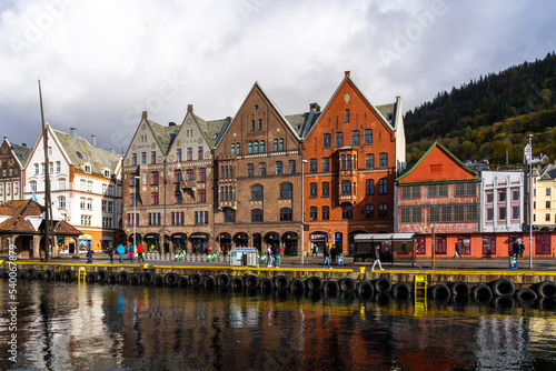  Bergen, Norway - October 10, 2022: Colorful Bryggen Hanseatic Wharf (Tyskebryggen) in Bergen, Norway. Bryggen Hanseatic Wharf is one of Bergen's most popular tourist attractions. 