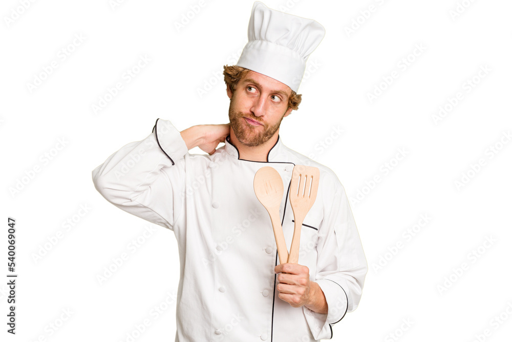 Young cook man isolated on white background touching back of head, thinking and making a choice. Young cook man isolated on white background touching back of head, thinking and making a choice.