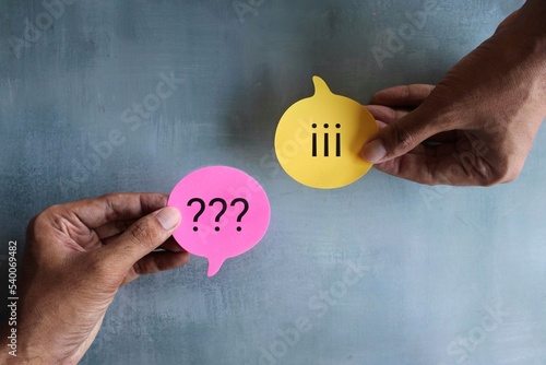 Speech bubble with a question mark and exclamation mark. Communication conflict, argument and dispute concept photo
