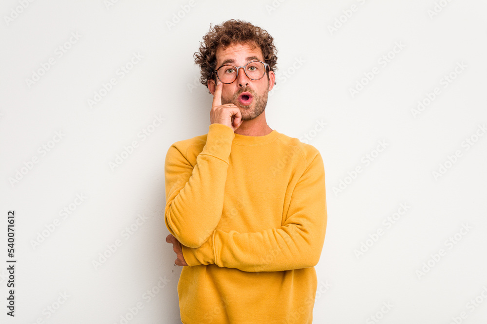 Young caucasian curly hair man isolated on white background having some great idea, concept of creativity. Young caucasian curly hair man isolated on white background having some great idea, concept of creativity.