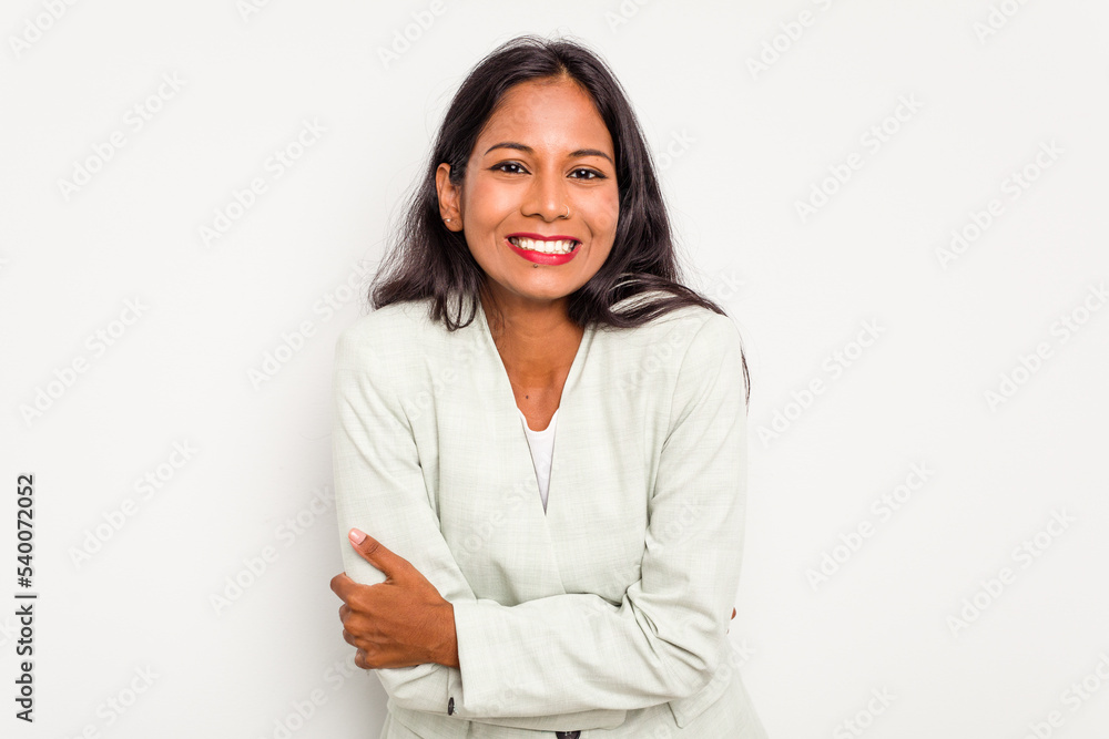Young business Indian woman isolated on white background laughing and having fun. Young business Indian woman isolated on white background laughing and having fun.