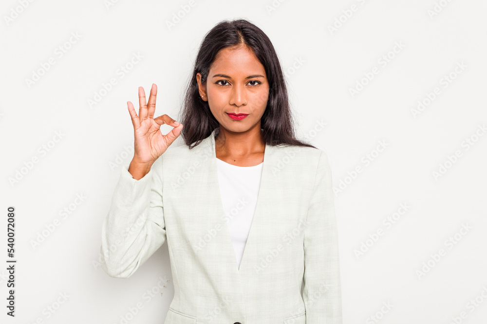 Young business Indian woman isolated on white background with fingers on lips keeping a secret. Young business Indian woman isolated on white background with fingers on lips keeping a secret.