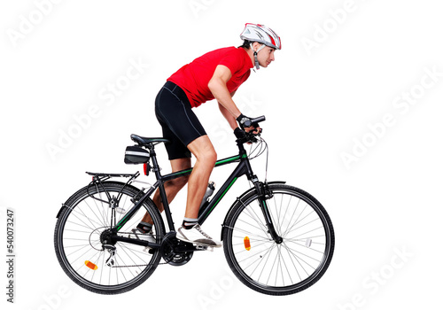Full length side view portrait of a cyclist riding his mountain bicycle in a white studio