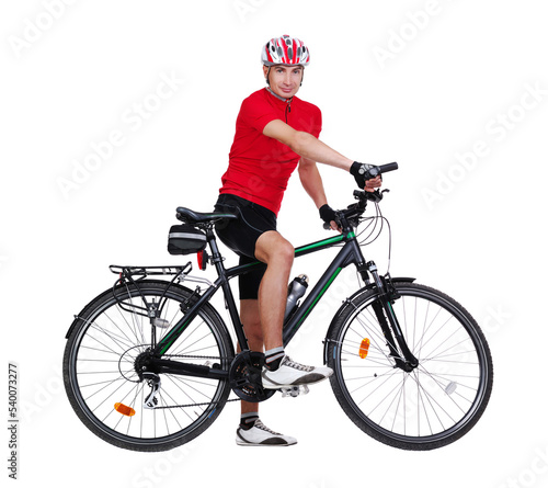 Full length side view picture of a cyclist sitting on his bicycle