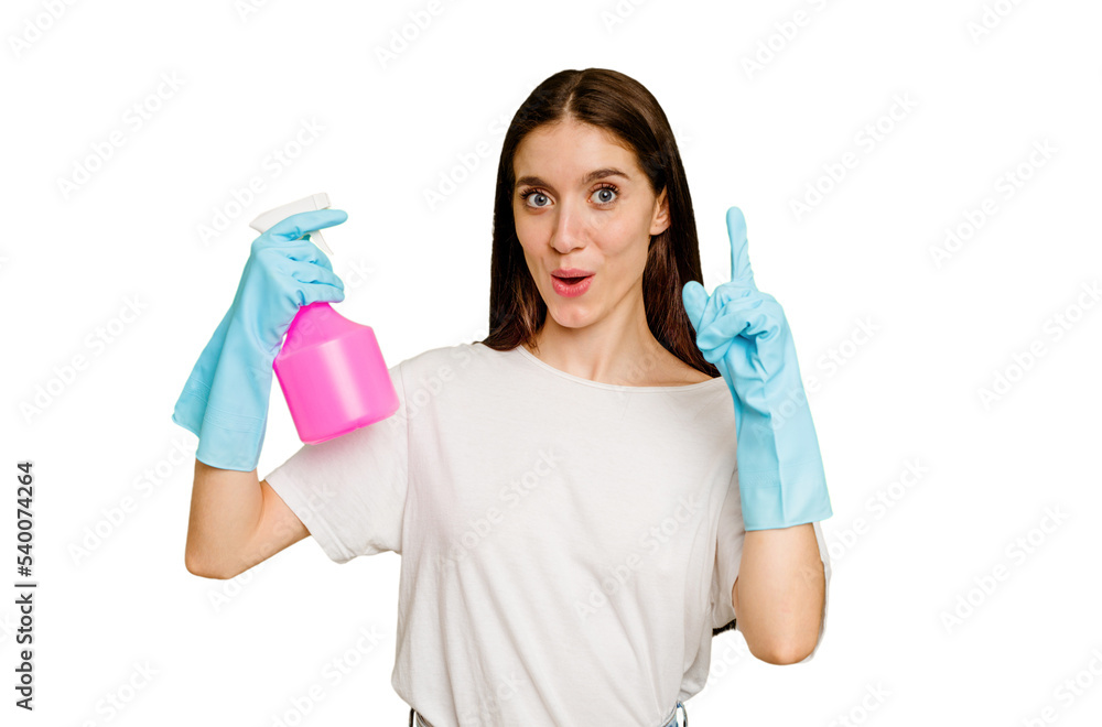 Young cleaner woman isolated having some great idea, concept of creativity. Young cleaner woman isolated having some great idea, concept of creativity.