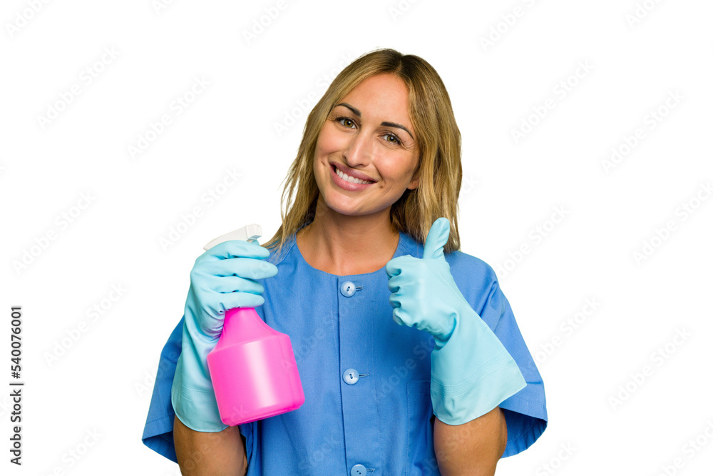Young cleaner caucasian woman isolated green chroma background smiling