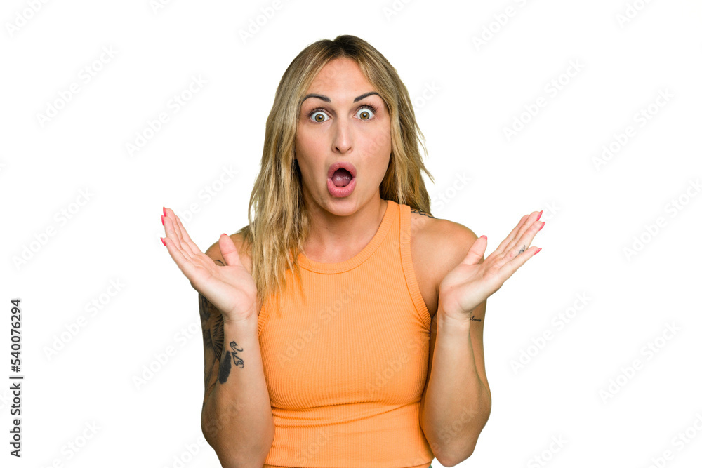 Young caucasian woman isolated on green chroma background surprised and shocked. Young caucasian woman isolated on green chroma background surprised and shocked.