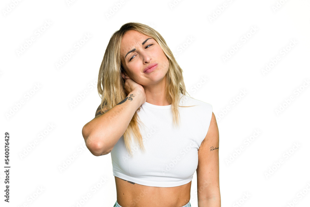Young caucasian woman isolated on green chroma background having a neck pain due to stress, massaging and touching it with hand. Young caucasian woman isolated on green chroma background having a neck pain due to stress, massaging and touching it with hand.