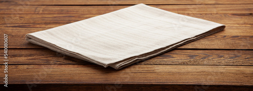 Empty canvas napkin on wooden desk top view