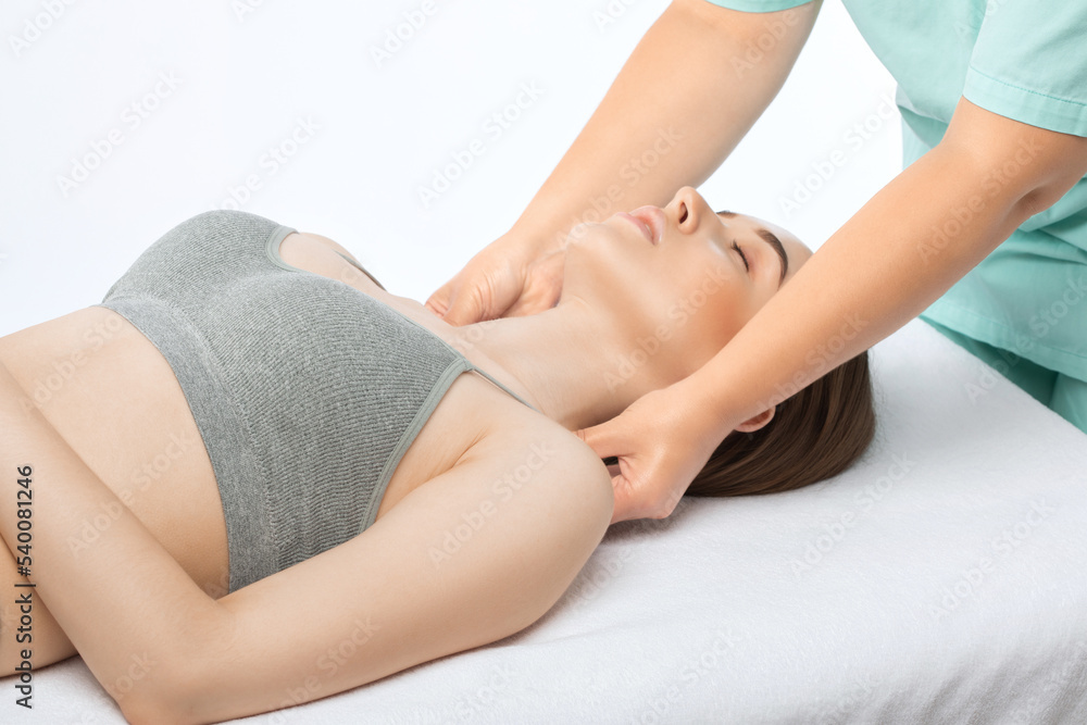 Masseur makes a relaxing massage on the neck, shoulders, back and collarbones of a young beautiful woman in a spa. Treatment for back pain. Masseur makes a relaxing massage on the neck, shoulders, back and collarbones of a young beautiful woman in a spa. Treatment for back pain.