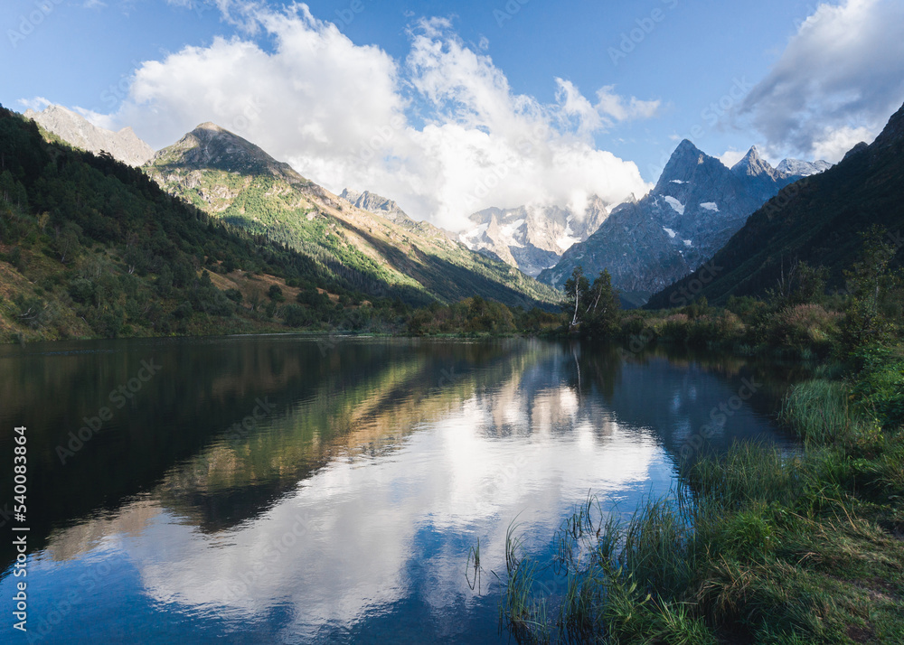lake in mountains in summer. Dombay, Caucasus