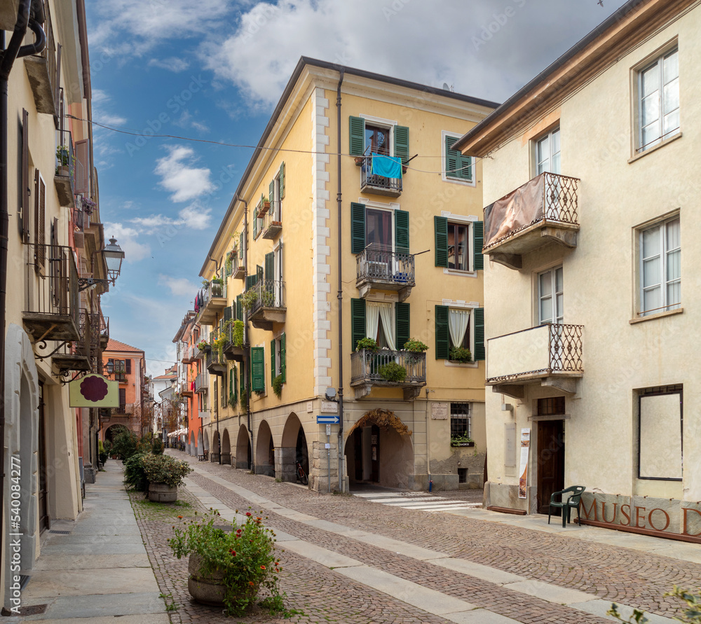 Cuneo, Piedmont, Italy - October 14, 2022: Contrada Mondovì, ancient street in the historic center with nineteenth-century buildings with arcades