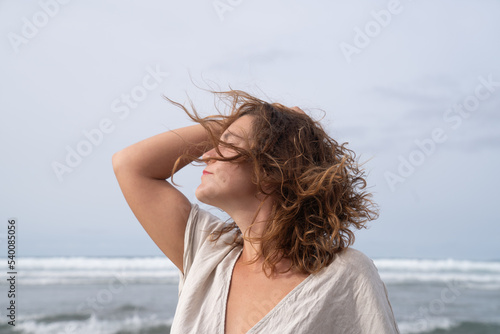 Girl enjoying herself in the beach