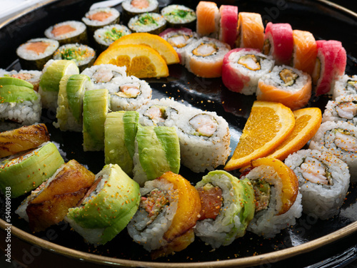 Sushi, Maki and Sliced Oranges