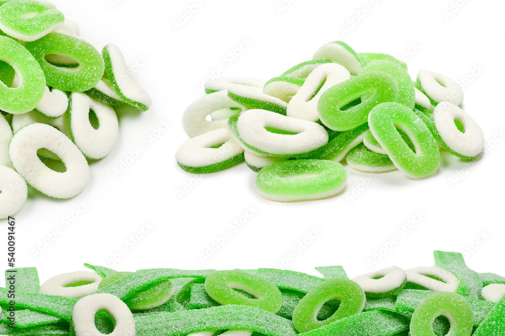 Frame of assorted green gummy candies isolated on white. Top view. Space for text or design. Frame of assorted green gummy candies isolated on white. Top view. Space for text or design.