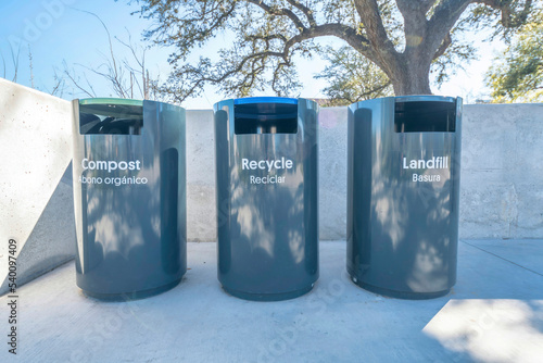 Black trash cans for segregation of wastes at Waterloo Park in Austin Texas
