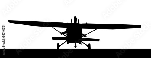 Fototapeta Naklejka Na Ścianę i Meble -  Front profile silhouette of landing X328 Atlas Angel Turbine skydiving equipped aircraft