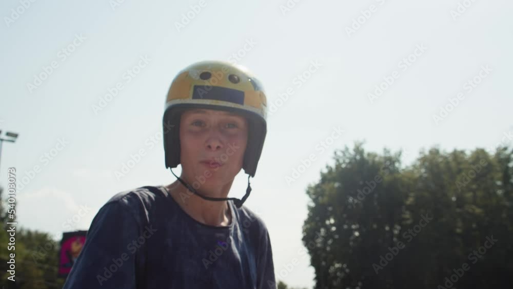 Portrait of man with kick scooter in concrete bowl, air extreme skate park, young skater sweating after training boy. Portrait of man with kick scooter in concrete bowl, air extreme skate park, young skater sweating after training boy.