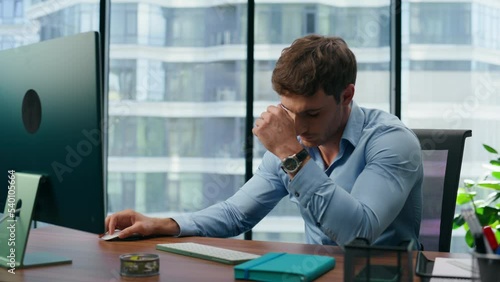 Despaired manager disappointed work failure closeup. Nervous man using computer photo