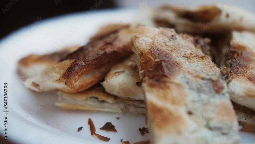 Turkish style meat stuffed pie, dough borek served on street food festival. Cheese and minced beef traditional pie. Turkish style meat stuffed pie, dough borek served on street food festival. Cheese and minced beef traditional pie.