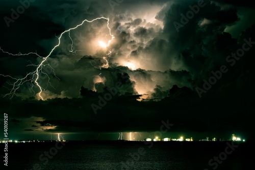 Scenic shot of a lighning strike at night