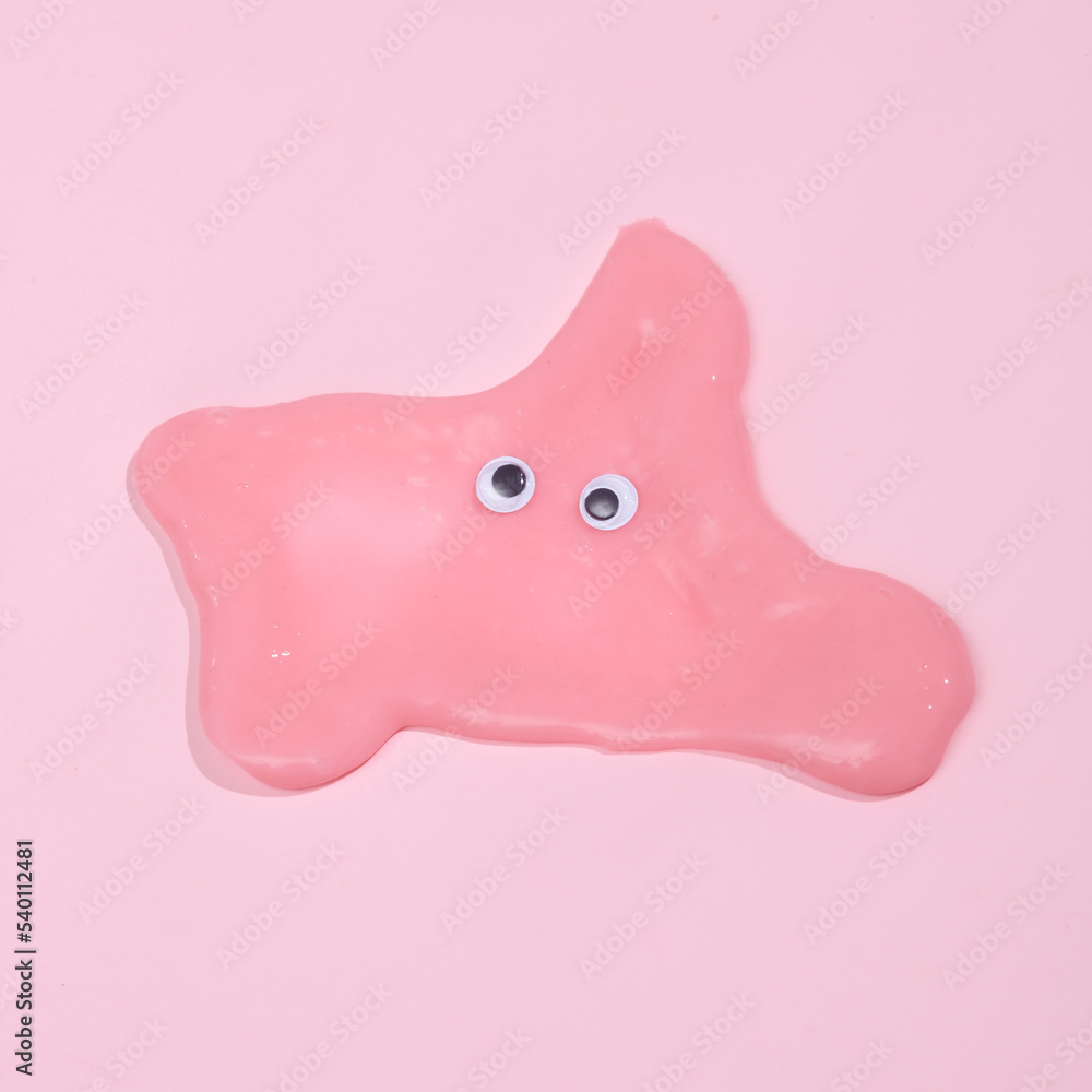 Blob slime with goggles on pink background Blob slime with goggles on pink background