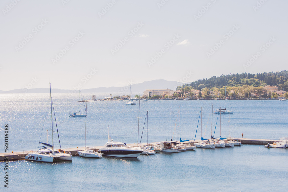 Marina in blue water in Greece