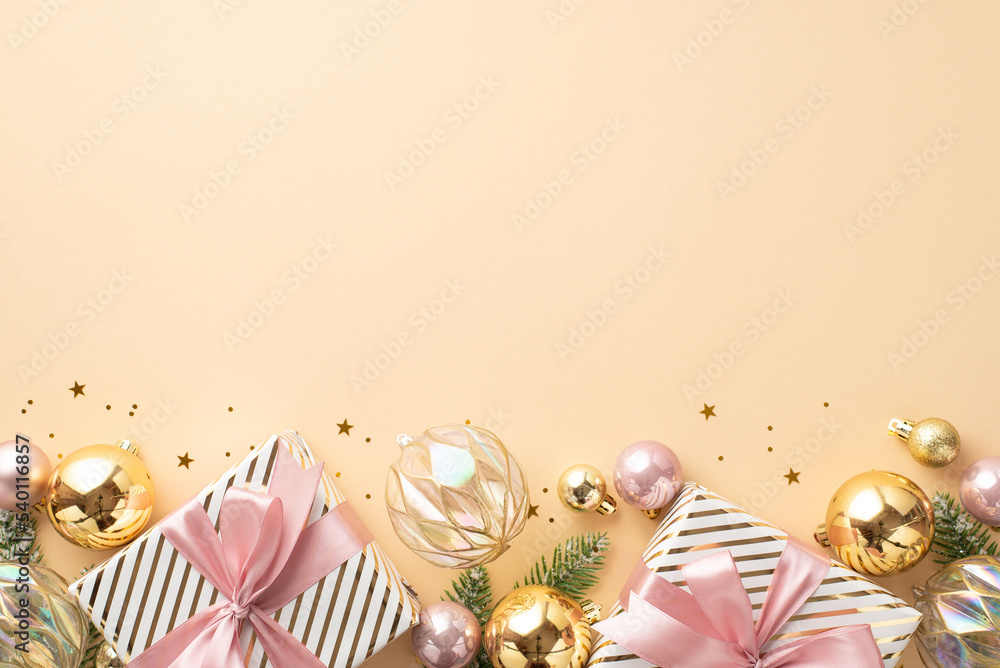 Christmas Eve concept. Top view photo of big present boxes with ribbon bows transparent gold pink baubles and glowing confetti on isolated pastel beige background with empty space
