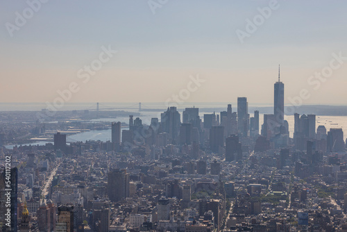 Beautiful view of in fog Manhattan's skyscrapers on cityscape background. New York. USA.