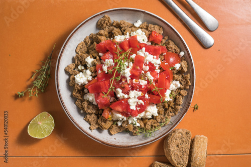 Dakos greece salad. Rusks with tomatoes and feta cheese. photo