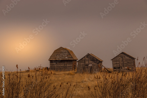 Sunrise over rustic farm buildings Keoma Alberta Canada