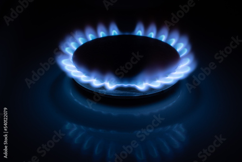 Gas burns with blue flames. Gas crisis around the world. Selective focus on the flame. Soft focus on the picture. Natural gas for housing