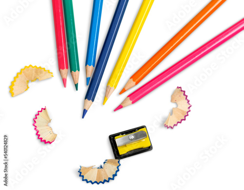 Set of colored pencils of different colors and a sharpener with shavings photo