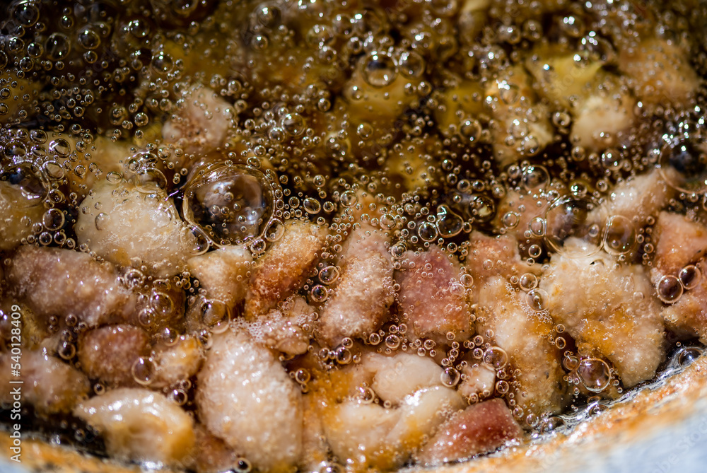 cooking chopped duck or goose fat. cooking chopped duck or goose fat.