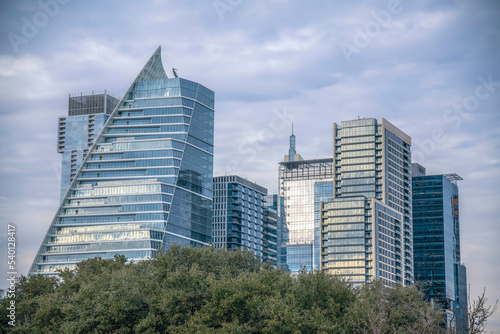 Modern buildings with reflective glass windows in Austin Texas on a cloudy day