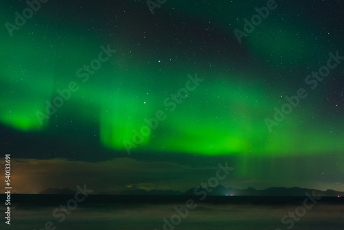 Fototapeta Naklejka Na Ścianę i Meble -  Beautiful colorful northern lights captured in the Lofoten Islands in northern Norway.