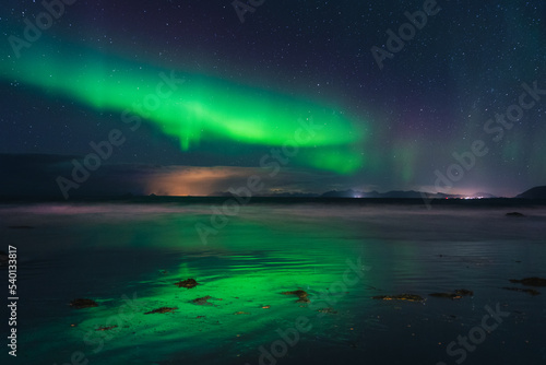Beautiful colorful northern lights captured in the Lofoten Islands in northern Norway. © PawelUchorczak