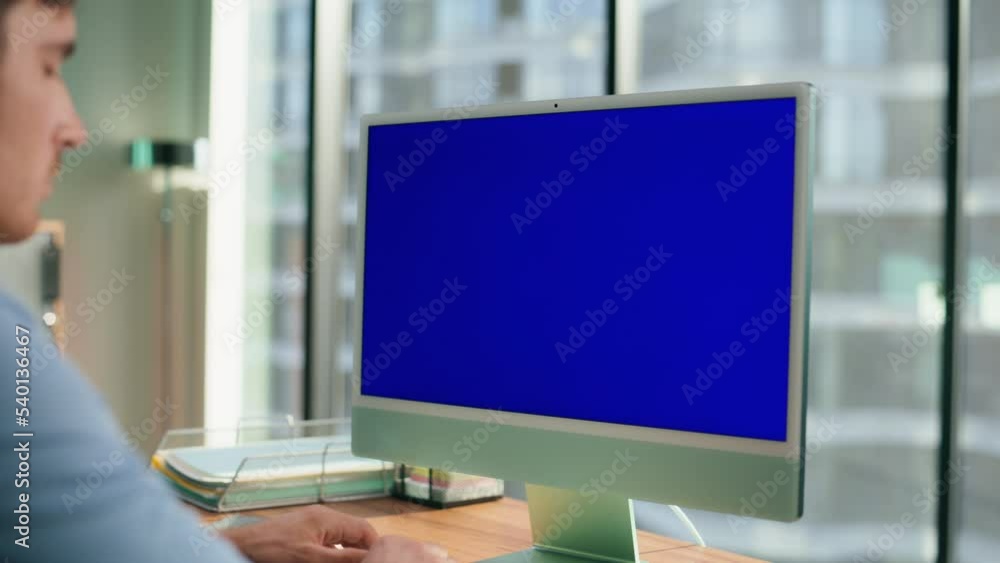 Unrecognized director working chroma key device. Businessman using computer Unrecognized director working chroma key device. Businessman using computer