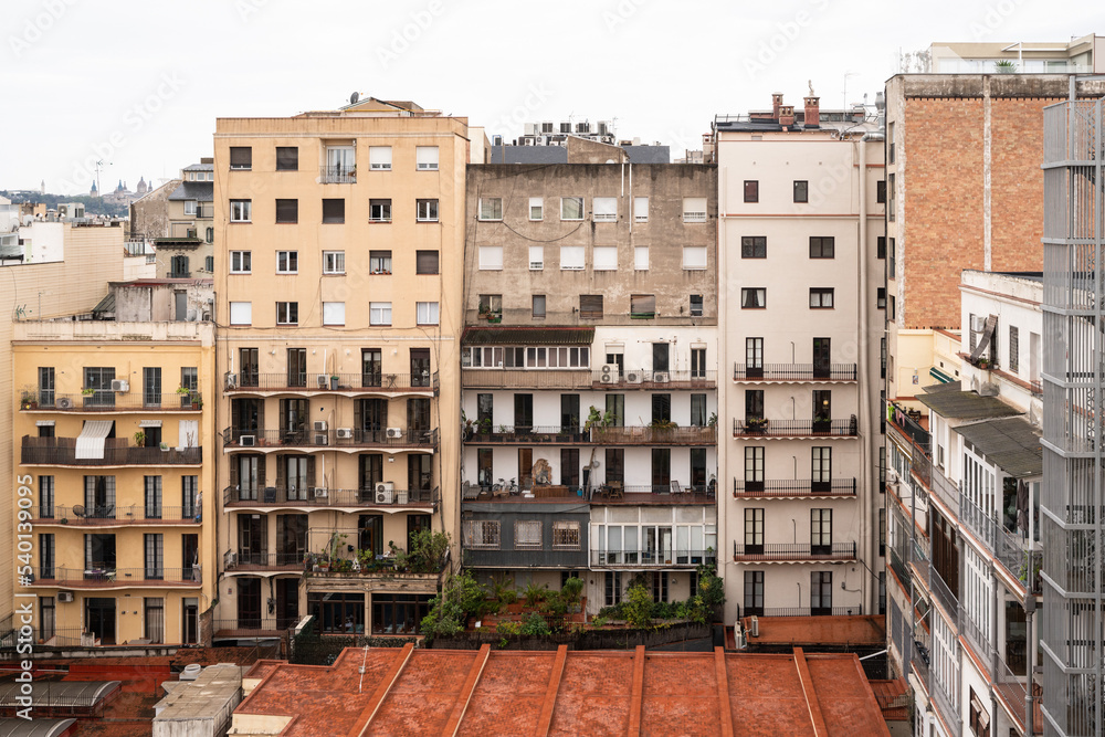 Cityscape view of exterior of typical apartment buildings seen from Barcelona Spain