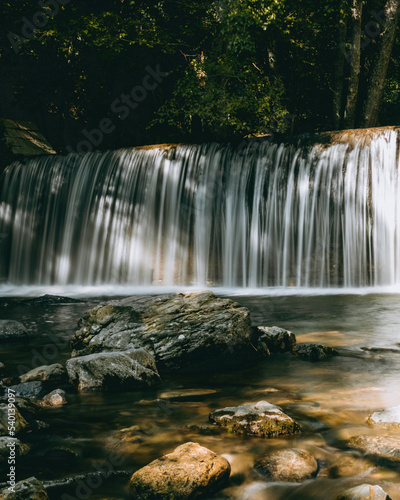 waterfall in autumn forest