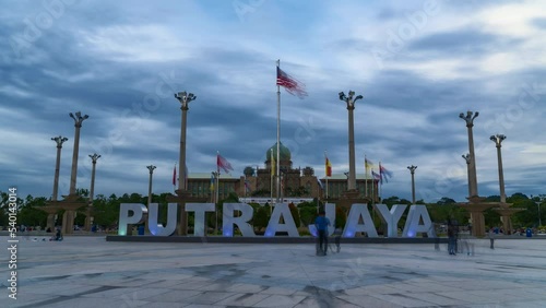 Time-lapse 4k UHD footage of Prime Minister Office at Putrajaya during sunset with tourist taking picture