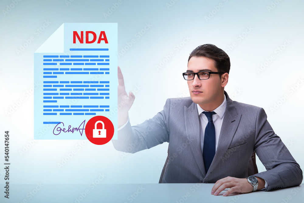 Businessman in non disclosure agreement concept Businessman in non disclosure agreement concept
