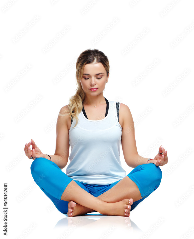 Front view picture of a young woman in a meditating pose Front view picture of a young woman in a meditating pose