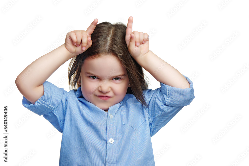 Funny girl showing horns with fingers Funny girl showing horns with fingers