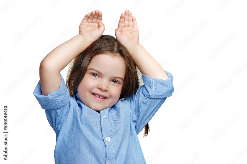 Funny little girl making rabbit ears with hands